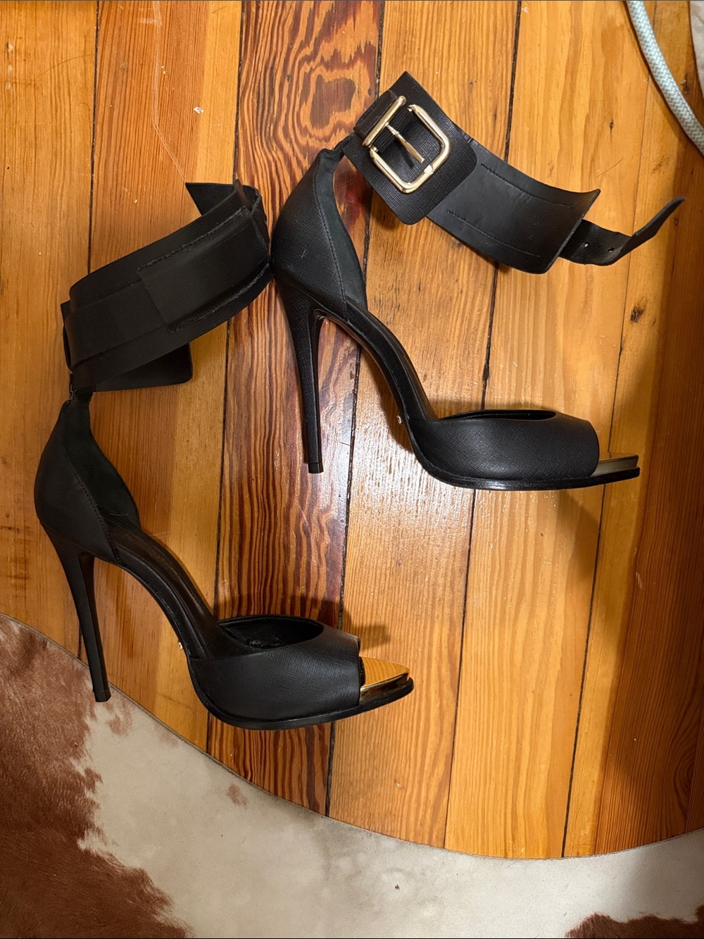 SCHUTZ Black Peep-Toe Stiletto Sandals with Gold Buckle Ankle Strap